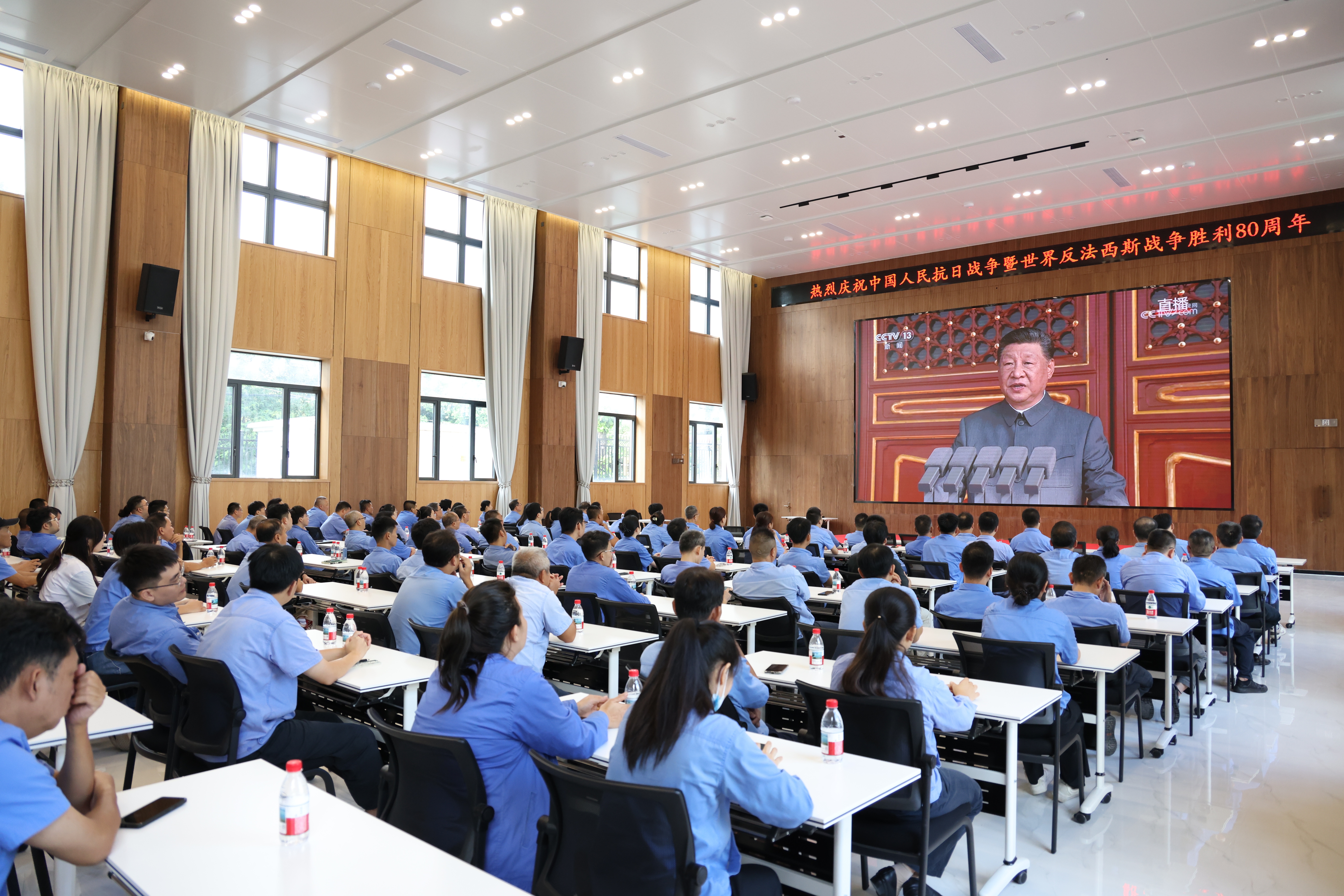 弘揚偉大抗戰精神 海南礦業組織收看九三勝利日大閱兵